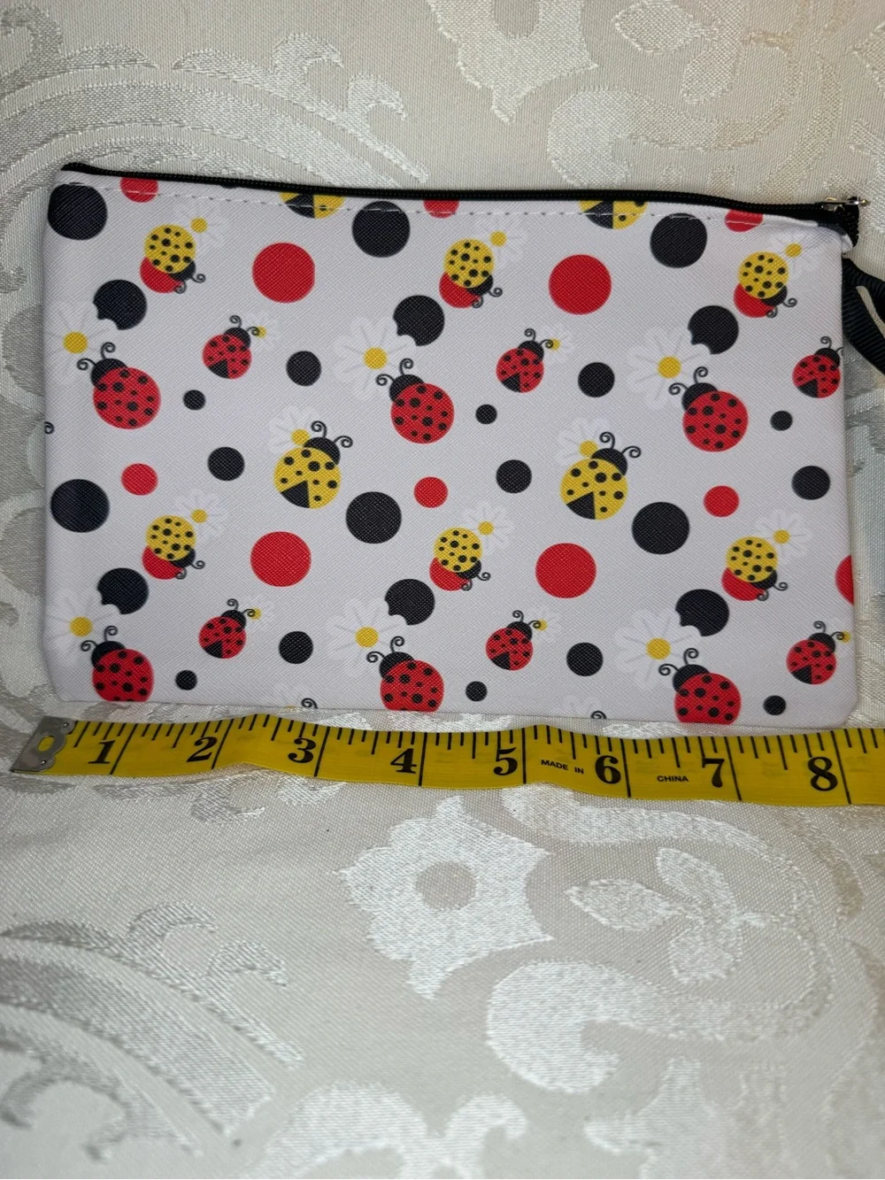 NWOT Ladybug Print Wristlet Pouch in Red, Yellow and Black